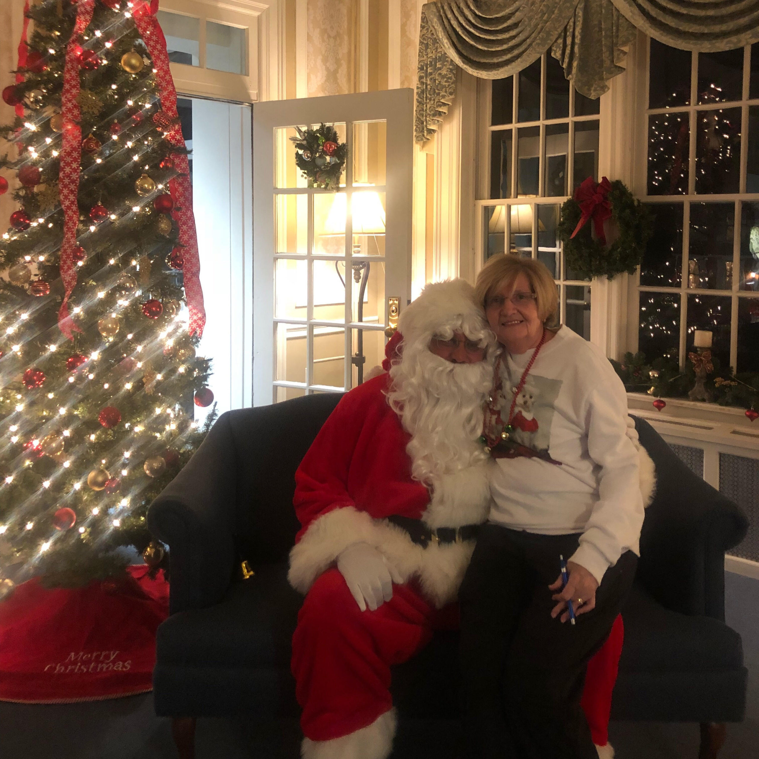 Santa posing with resident at Kadima at Lititz Nursing and Rehabilitation Facility