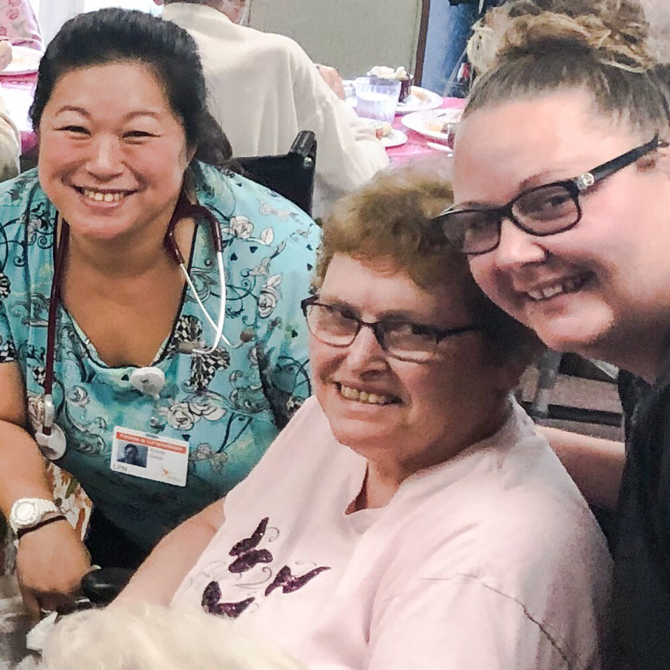 Image of staff members with old woman at Kadima at Campbelltown Nursing and Rehabilitation Facility