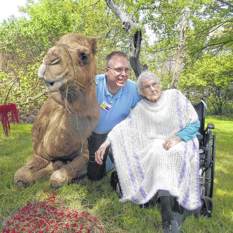 Image of Elderly woman and Camel outside Kadima at Luzerne Nursing and Rehabilitation Facility